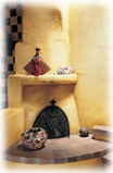 A warming kiva fireplace in a Taos home.